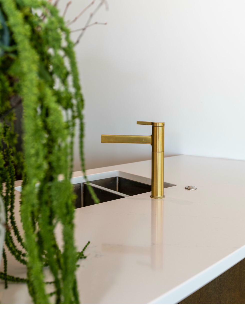 Kitchen detail with brass fixtures